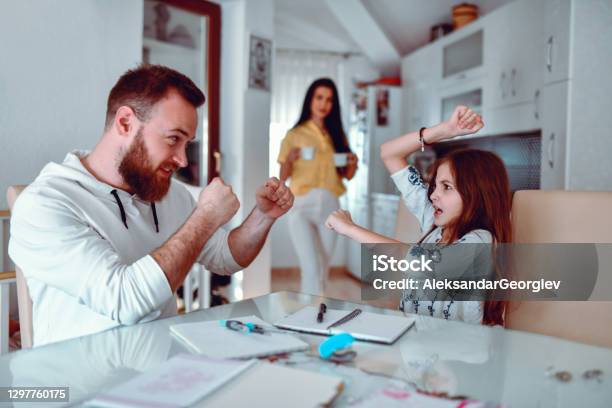 Father Playfully Staging Boxing Fight With Child Daughter Stock Photo - Download Image Now