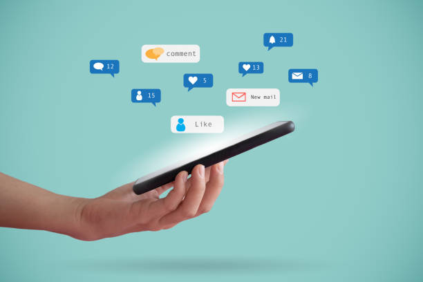 istock Hand hold smartphone play social media with communication icon. Technology concept. 1297760854