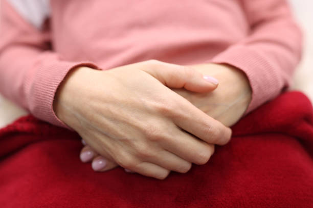 istock Women's hands are folded together. Feminine serenity and self-confidence 1297762139
