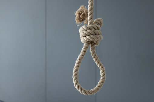 Loop of rope for suicide hanging on ceiling of house