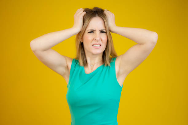 istock Young caucasian woman over isolated background doing nervous gesture 1297762667