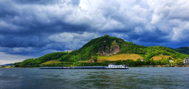 istock River, hills and volcanic landscape against stormy sky 1297764143