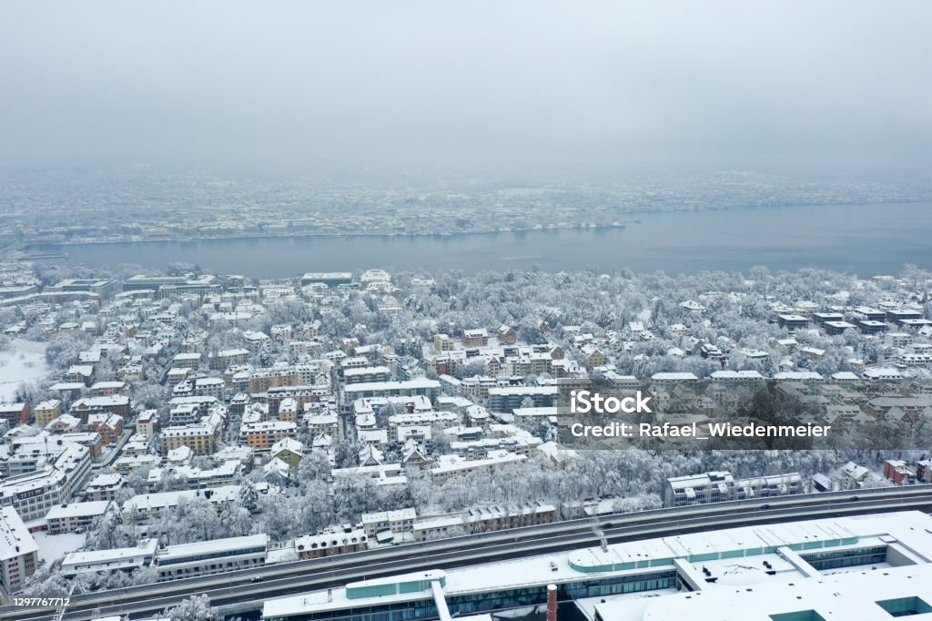 Zurich Enge winter panorama Zurich Enge winter panorama with the famous lake Zurich in background. The high angle image was captured after heavy snowfall during winter season. High Angle View Stock Photo