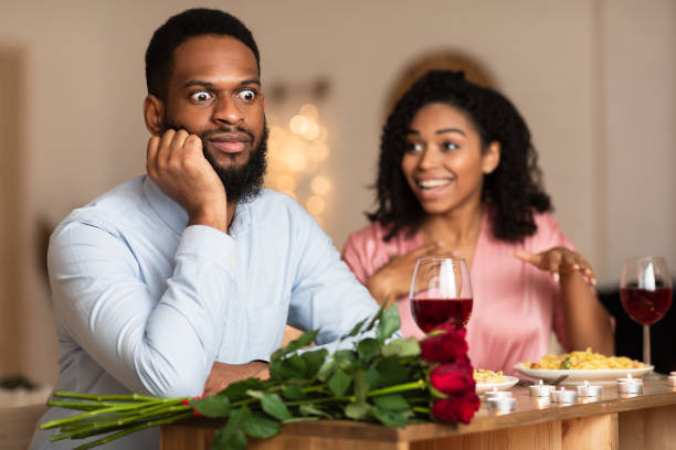 istock Black Couple On Unsuccessful Blind Date In Restaurant 1297770047