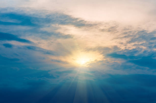 istock Storm Clouds in the blue sky and sun, background 1297773125