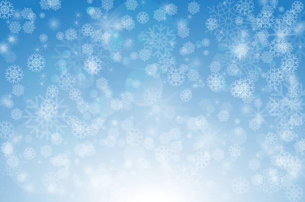istock Winter snowfall on a blue background. Cold winter. Christmas and New Year background. White snowflakes on a blue background. 1297776311