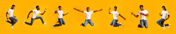 istock Funny African Guy Jumping Posing Having Fun, Yellow Background, Collage 1297776349