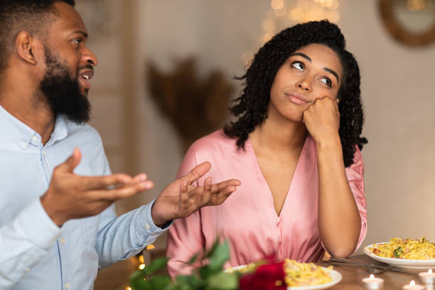istock Unhappy Sad Black Couple Arguing During Dinner 1297777823