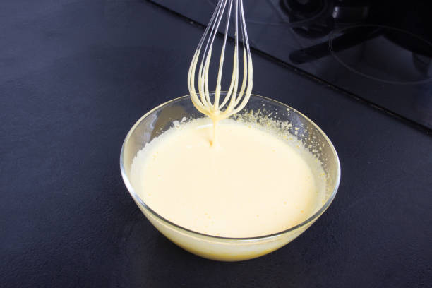 istock whipped eggs in glass bowl on kitchen 1297780171