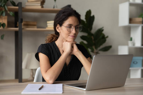 istock Happy woman work online on computer gadget 1297781564