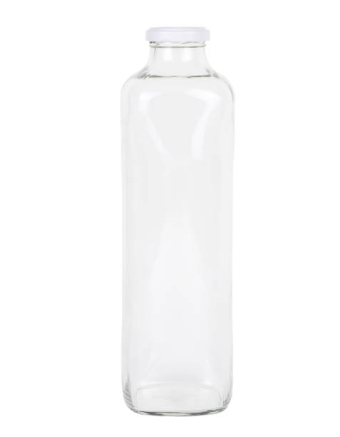 istock Empty glass bottle isolated on a white background. Clear bottle. Front view 1297784387