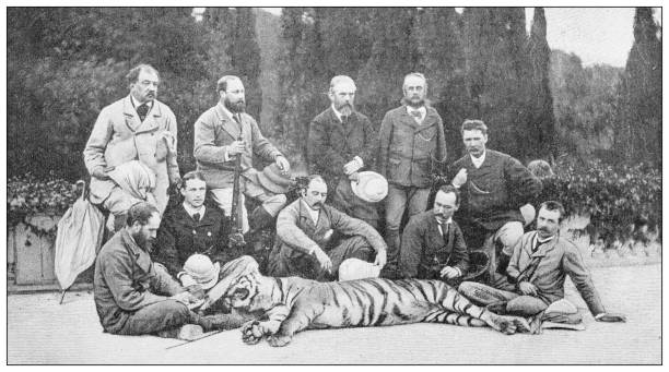 antyczne czarno-białe zdjęcie: polowanie z rodziną królewską, książę walii w indiach - duke stock illustrations