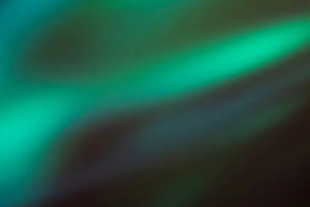 Photo of Abstract blue, turquoise and green blurred light background for mockups. Trendy creative gradient.