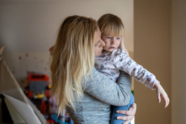 istock Mother having fun in kid's room 1297788243