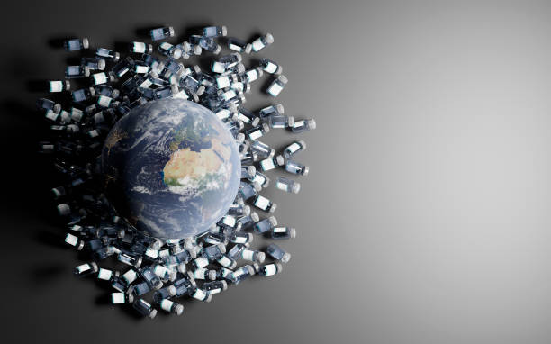 istock planet earth over many canisters of coronavirus vaccine. copyspace 1297788250