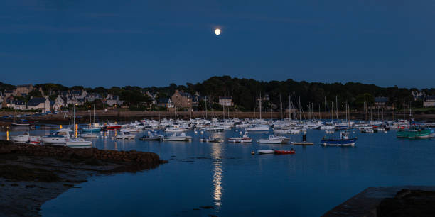 Ploumanach, France - August, 25 - 2020: Harbor of Ploumanach on a clear night in summer