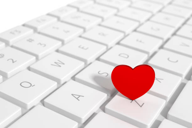 istock White computer keyboard button with red heart sign symbol 3d rendering. 3d illustration Internet dating of Love and Valentines Day greeting card template minimal concept. 1297795343