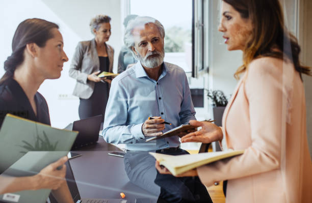 istock Business people having a meeting in the office 1297795410
