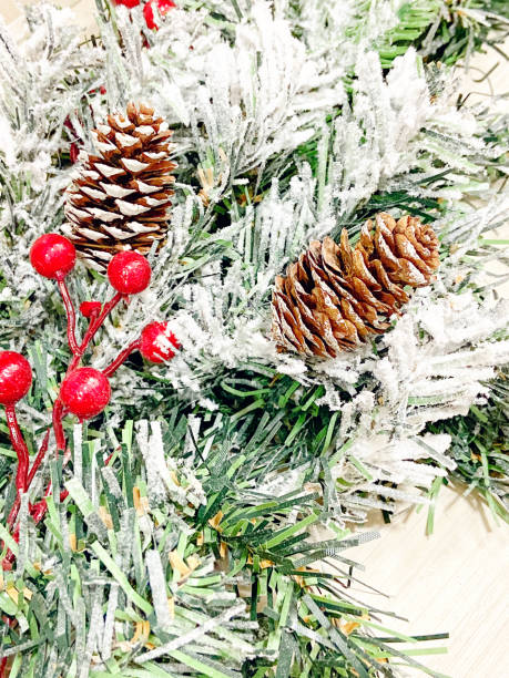 istock Christmas Evergreen Tree Background with Berries 1297798394
