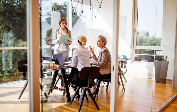 istock Business people having a meeting in the office 1297801334