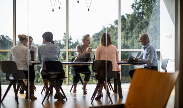 istock Business people having a meeting in the office 1297802137