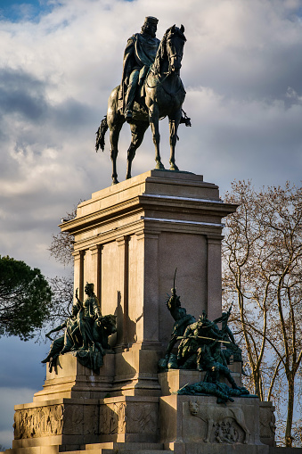 The equestrian monument of Giuseppe Garibaldi, hero of the Unification and Independence of Italy during the wars of the nineteenth century, on top of the gardens of the Janiculum hill. From this hill, located on the right bank of the Tiber river, it is possible to admire a series of spectacular views over the historic center of Rome and the famous Trastevere district, up to the central Appenine mountains. This equestrian statue was made by the sculptor Emilio Gallori and was inaugurated on 20 September 1895. Image in High Definition format.