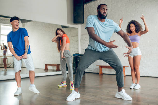 istock Dancing african american and young people watching 1297804442