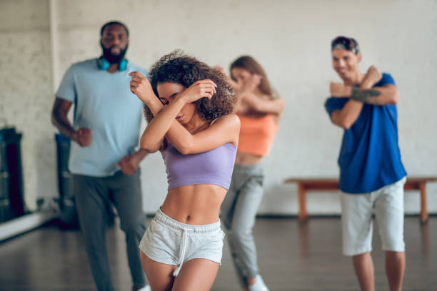 istock Young girl with friends rehearsing in studio 1297804540
