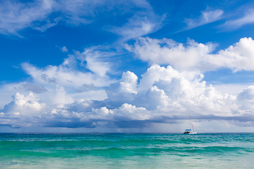 catamaran and horizon over water at seychelles islands, indian ocean.