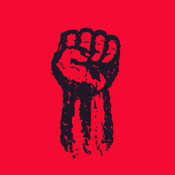 istock Fist held high in protest, hand raised up, grunge revolt symbol 1297806370