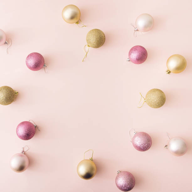 istock Christmas Baubles on  pink background.Minimal Flat Lay.New Year concept. 1297807128