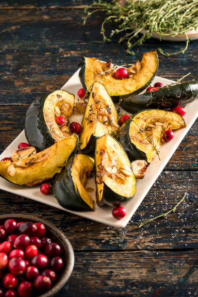 istock Baked Acorn Squash with Cranberries 1297816713
