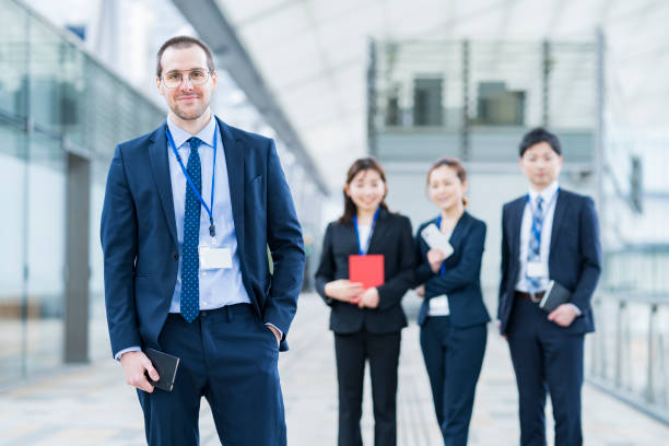 istock Businessman and his business team 1297817671