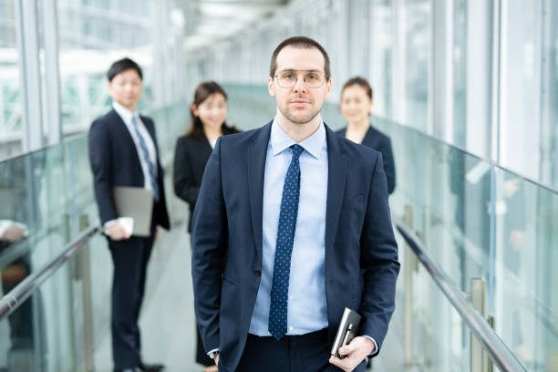istock Businessman and his business team 1297817874