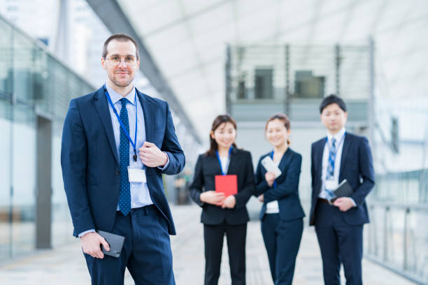 istock Businessman and his business team 1297817955