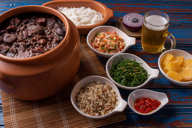 istock Traditional Brazilian food called Feijoada. Black beans with pork 1297818560