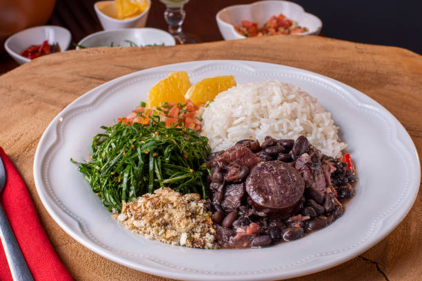 istock Traditional Brazilian food called Feijoada. Black beans with pork 1297818875