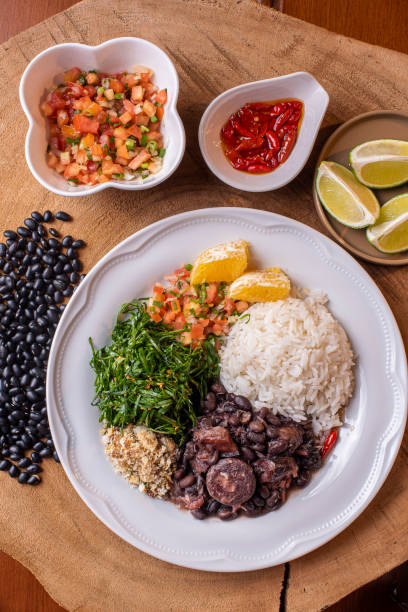 istock Traditional Brazilian food called Feijoada. Black beans with pork 1297819007