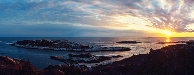 Panoramic view of sunset on the Atlantic coast of Nova Scotia.
