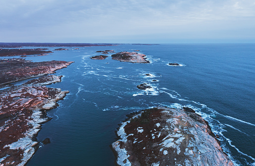 Aerial drone view of Nova Scotian coastline during the blue hour.