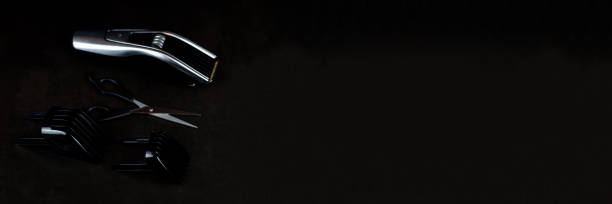 istock hair clipper black background. 1297819185