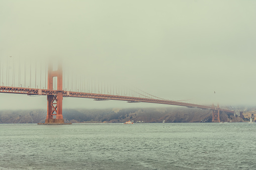 San Francisco's iconic Golden Gate Bridge shown in a unique abstraction by zooming the lens during exposure.