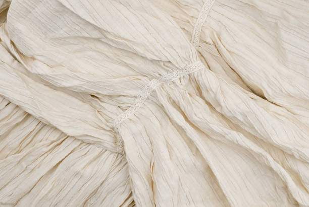 istock Abstract fashion background with pastel beige fabric 1297820523