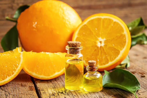 istock Essential aroma oil with citrus on wooden background. Selective focus. 1297820525