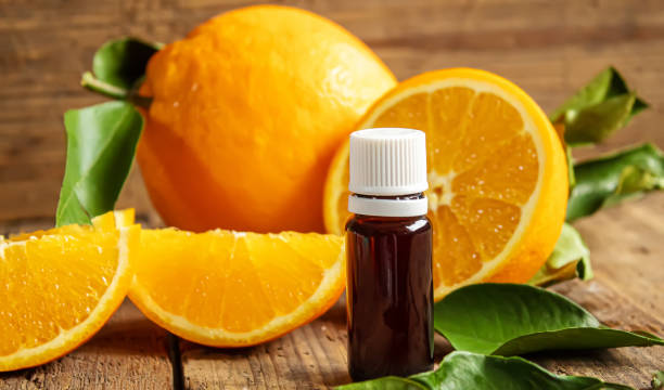 istock Essential aroma oil with citrus on wooden background. Selective focus. 1297820533