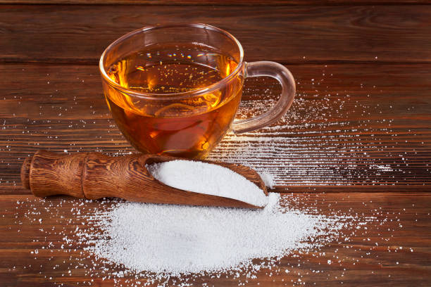 istock Cup of tea and scoop of sorbitol 1297821811