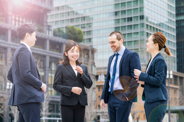 istock Business team talking on street 1297822180