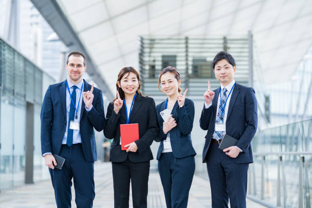 istock Business team in a cheering pose 1297824495