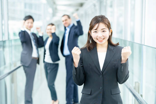 istock Business team in a cheering pose 1297824778