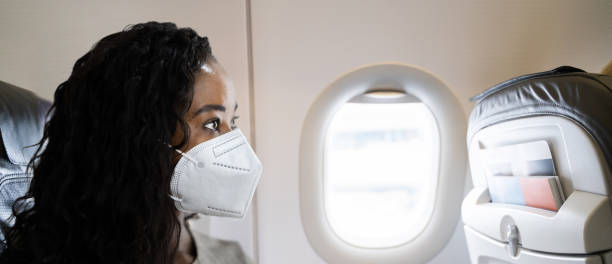 istock African Woman In Face Mask 1297825403